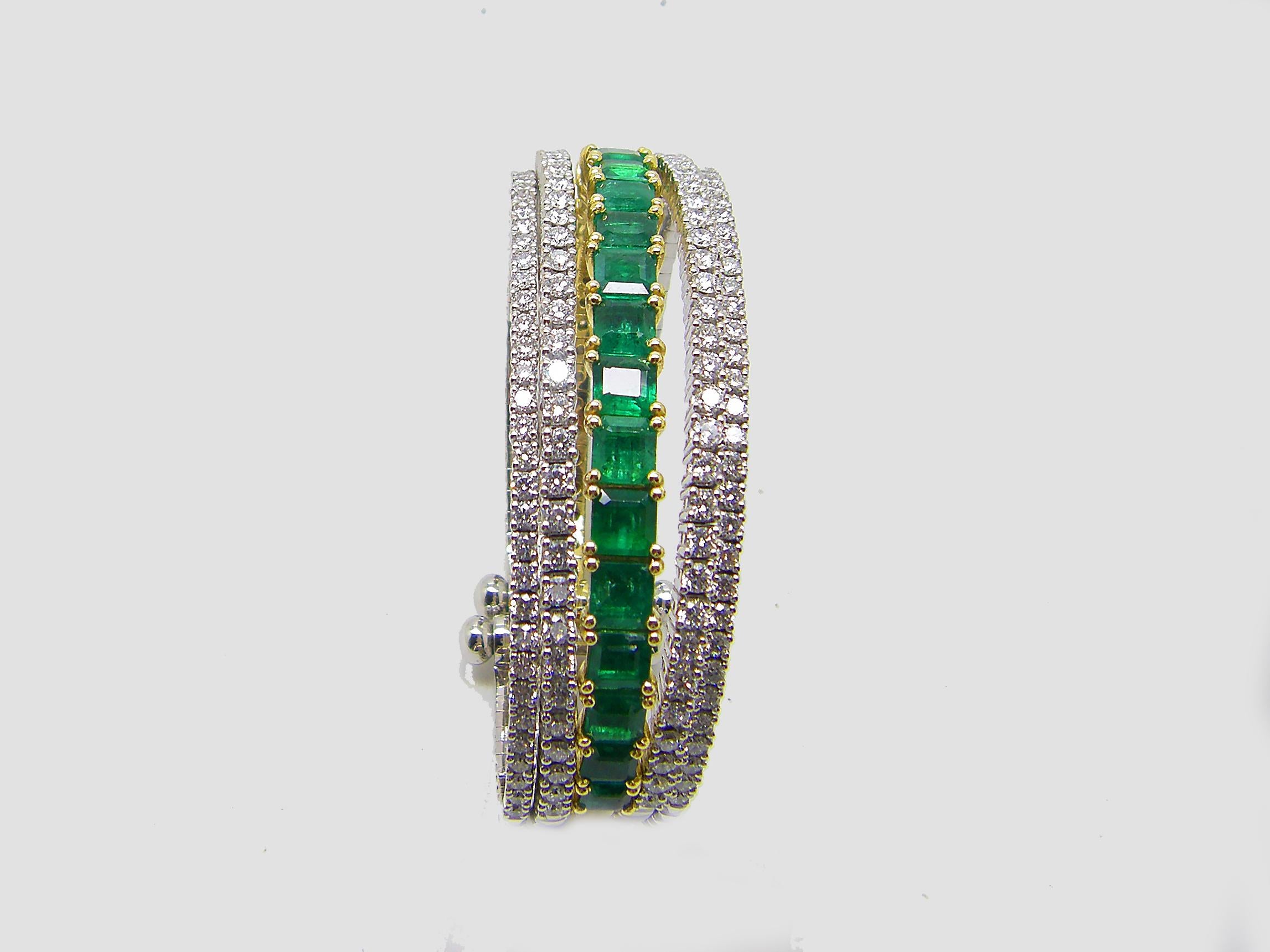 S.Georgios designer flexible Five bangle cuff multi-layers bracelet is custom made of white and yellow gold 18 karats. The gorgeous cuff has brilliant cut white diamonds total weight of 5.86 Carat and Emerald cut natural Emeralds total weight of