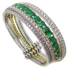 Bracelet manchette collection Georgios en or blanc et jaune 18 carats avec émeraudes et diamants