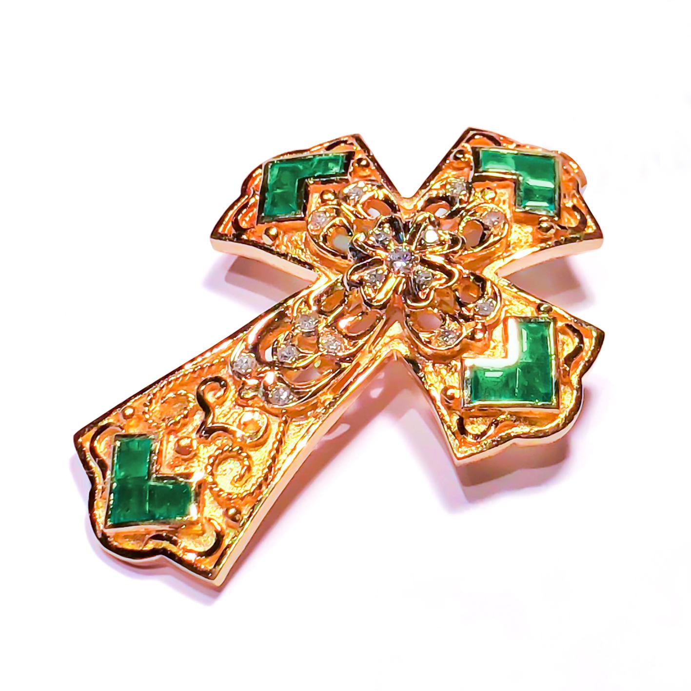 S.Georgios Designer Cross is handmade from solid 18 Karat Yellow Gold and has Granulation work and a beautiful matt finish. It features Diamond's total weight of 0,24 Carats and Emerald's total weight of 2,00 Carats. This art piece is made as an
