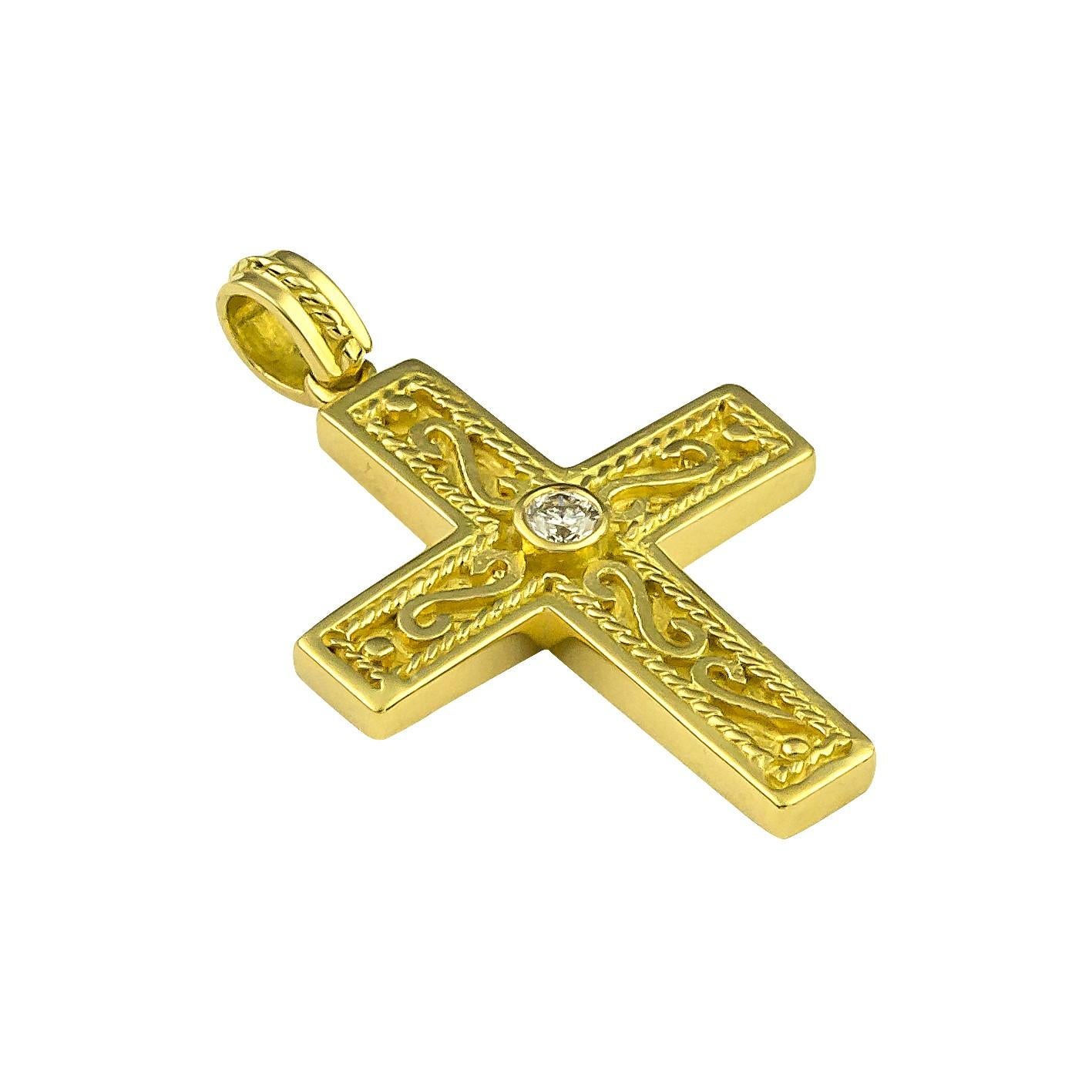 This S.Georgios designer Cross Pendant enhancer is all handmade from solid 18 Karat Yellow Gold and is microscopically decorated with granulation work all the way around. The background of the Cross has a unique velvet look and features a Brilliant