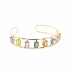 Bracelet manchette collection Georgios en or jaune 18 carats avec plusieurs saphirs