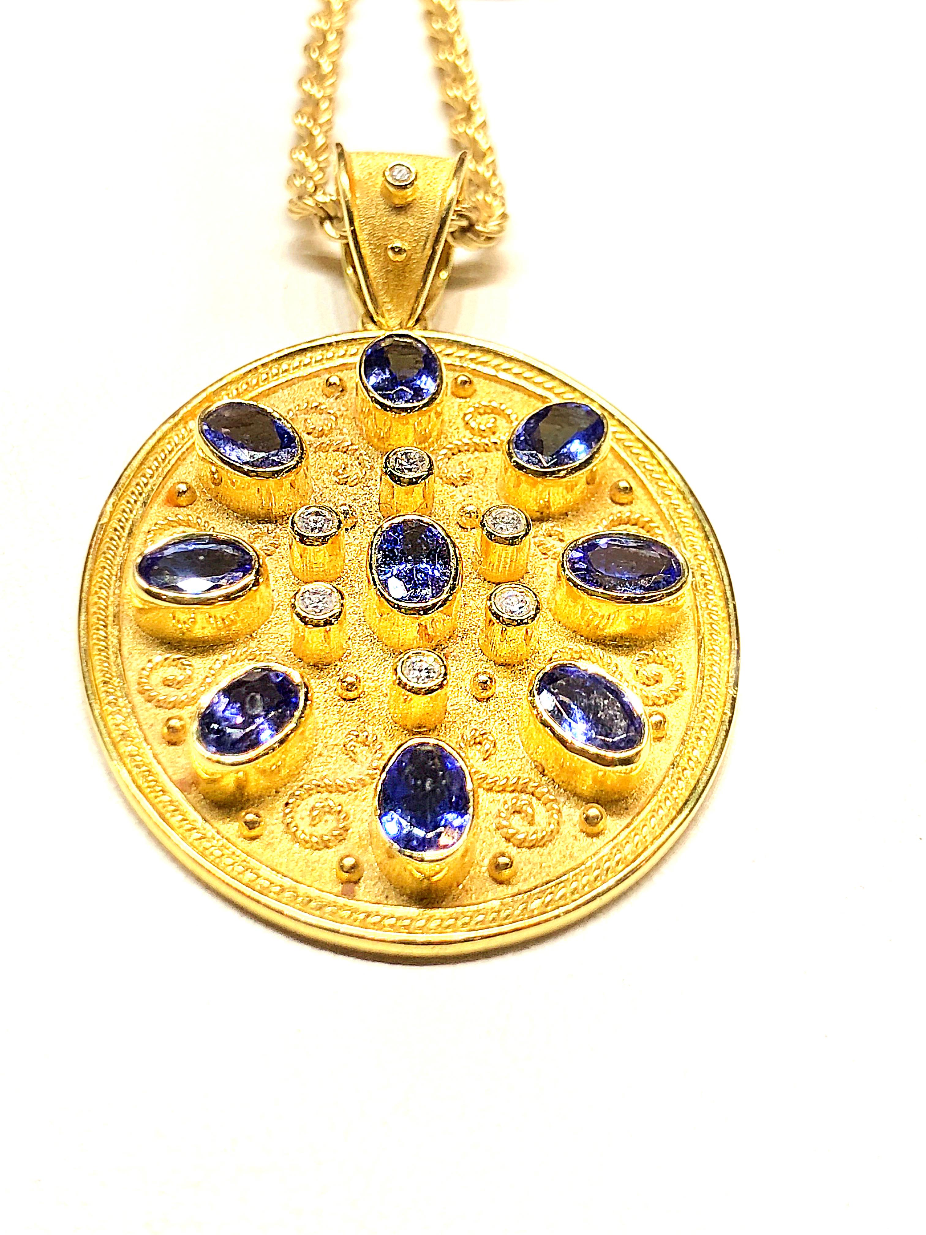 S.Georgios unique designer pendant is all handmade in 18 Karat Yellow Gold and custom-made. It's microscopically decorated - with granulation work all the way around in Gold 22 Karat beads and wires shaped like the last letter of the Greek Alphabet