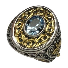 Georgios Collections Anillo de oro de 18 quilates y plata con topacio azul granulado
