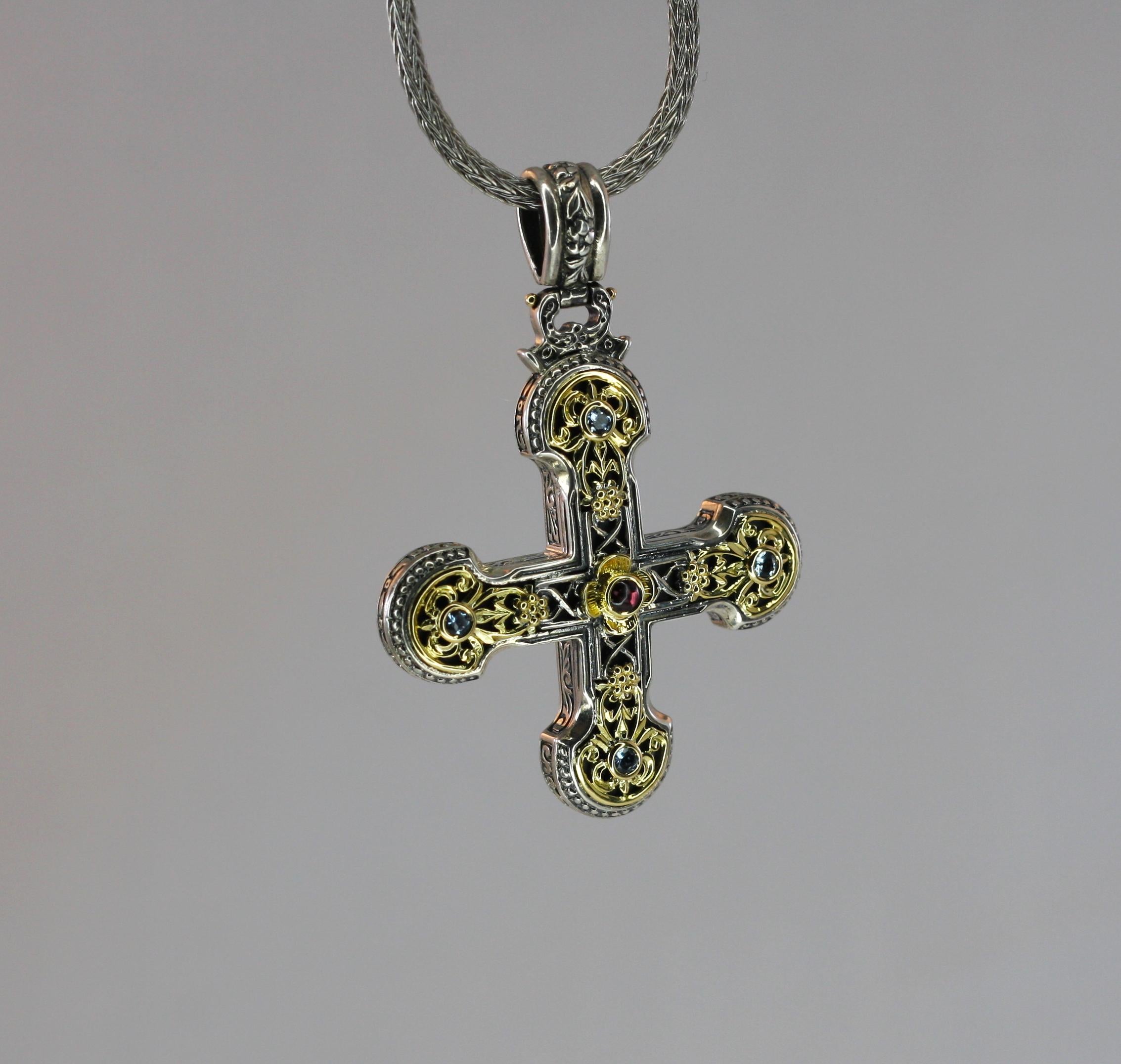 Presenting all handmade heavy decorated Cross pendant crafted from sterling silver and solid 18 Karat yellow gold inlay to create a unique look. This enhancer features 1.21 Carat Tourmaline and 0.60 Carat Topaz in total. Cross has a wide hook to be