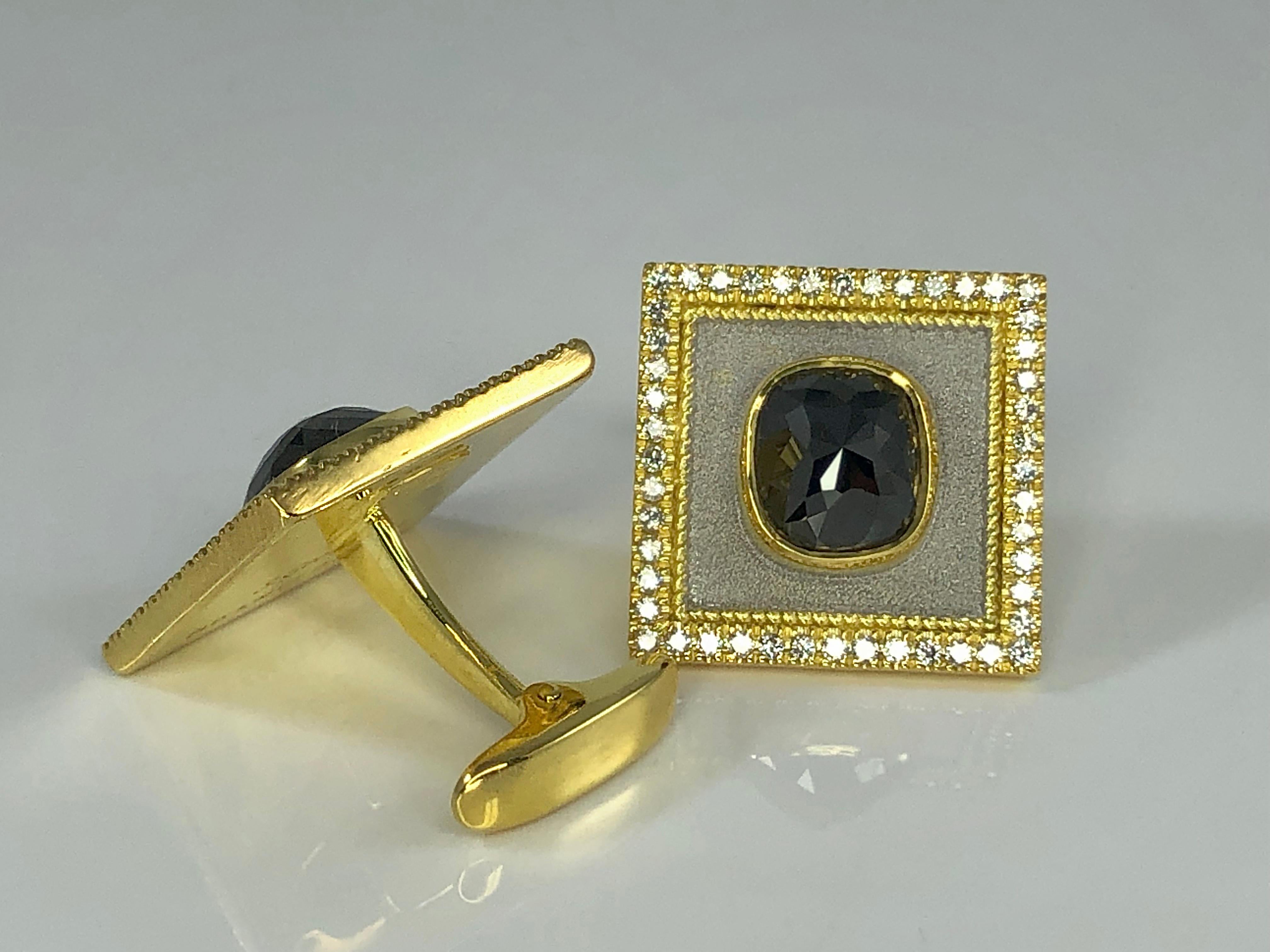 S.Georgios designer cufflinks handcrafted in Greece from 18 Karat yellow gold and decorated around the edges with brilliant-cut natural White Diamonds with a total weight of 0.94 Carat and two (2) Rose-cut Black Diamonds both a total weight of 5.96