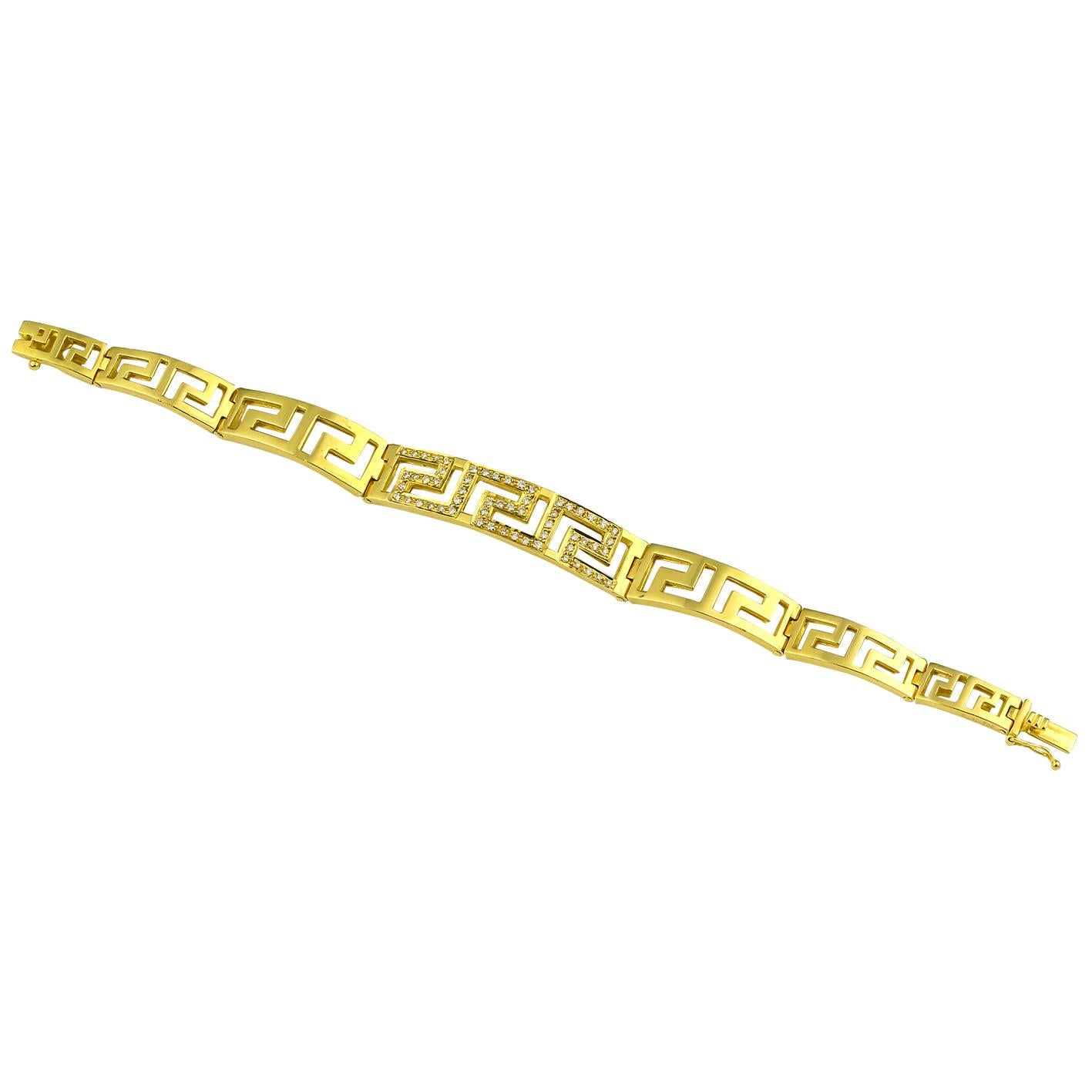 S.Georgios designer Greek Key bracelet in solid yellow gold 18 karats all handmade with the Greek Key design, the symbol of eternal life. The Bracelet is custom made and has brilliant cut white diamonds total weight of 0.65 Carat.
This beautiful