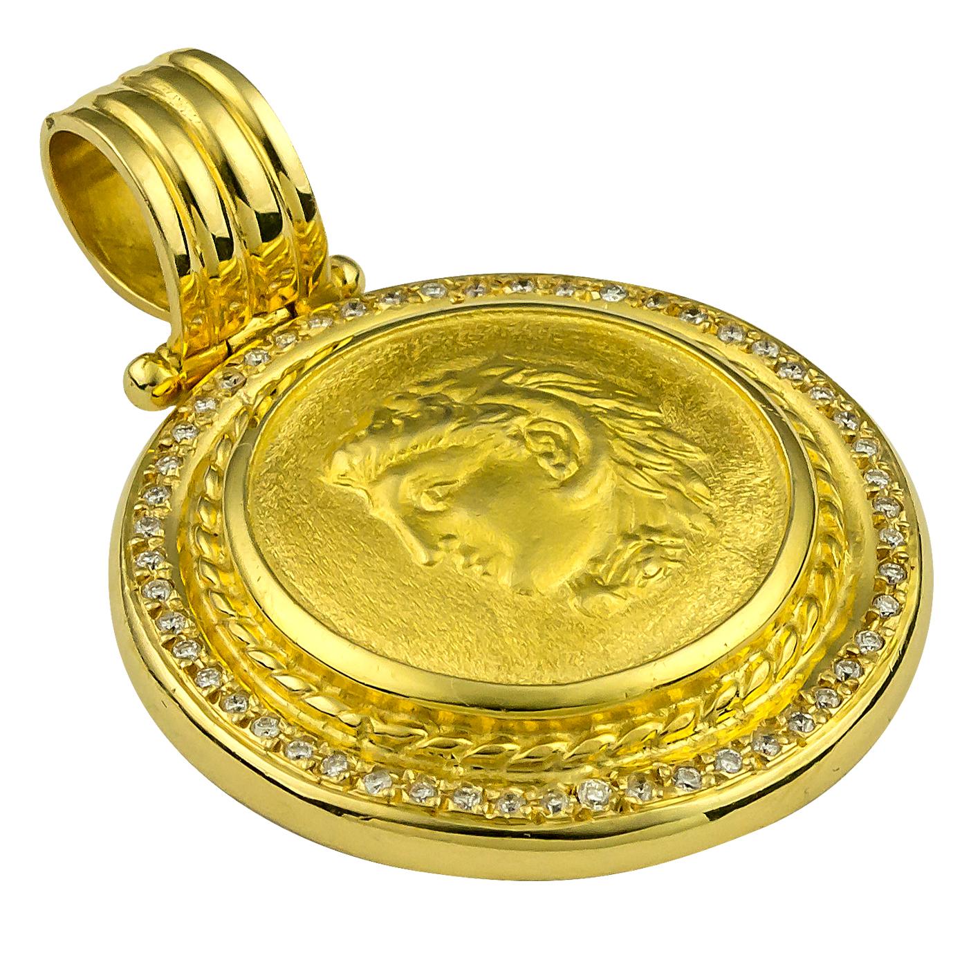 This S.Georgios designer 18 Karat Yellow Gold Diamond Coin Pendant is all handmade and features a Gold Coin of Alexander the Great, (the coin is an exact copy of the original) the Symbol of Strength and has Brilliant cut Diamonds around the coin