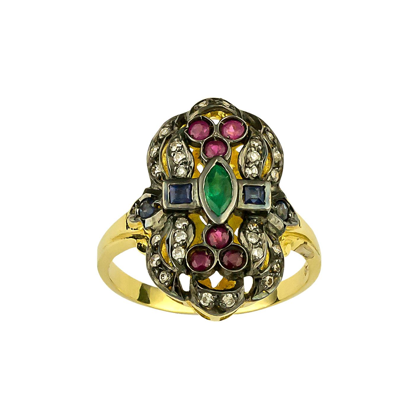 Unique S.Georgios Designer Hand Made 18 Karat Yellow Gold Ring decorated with Byzantine-style granulation and a combination of Diamonds, Rubies, Sapphires, and a center Emerald.
The Ring features Brilliant cut Diamonds total weight of 0,22 Carat,