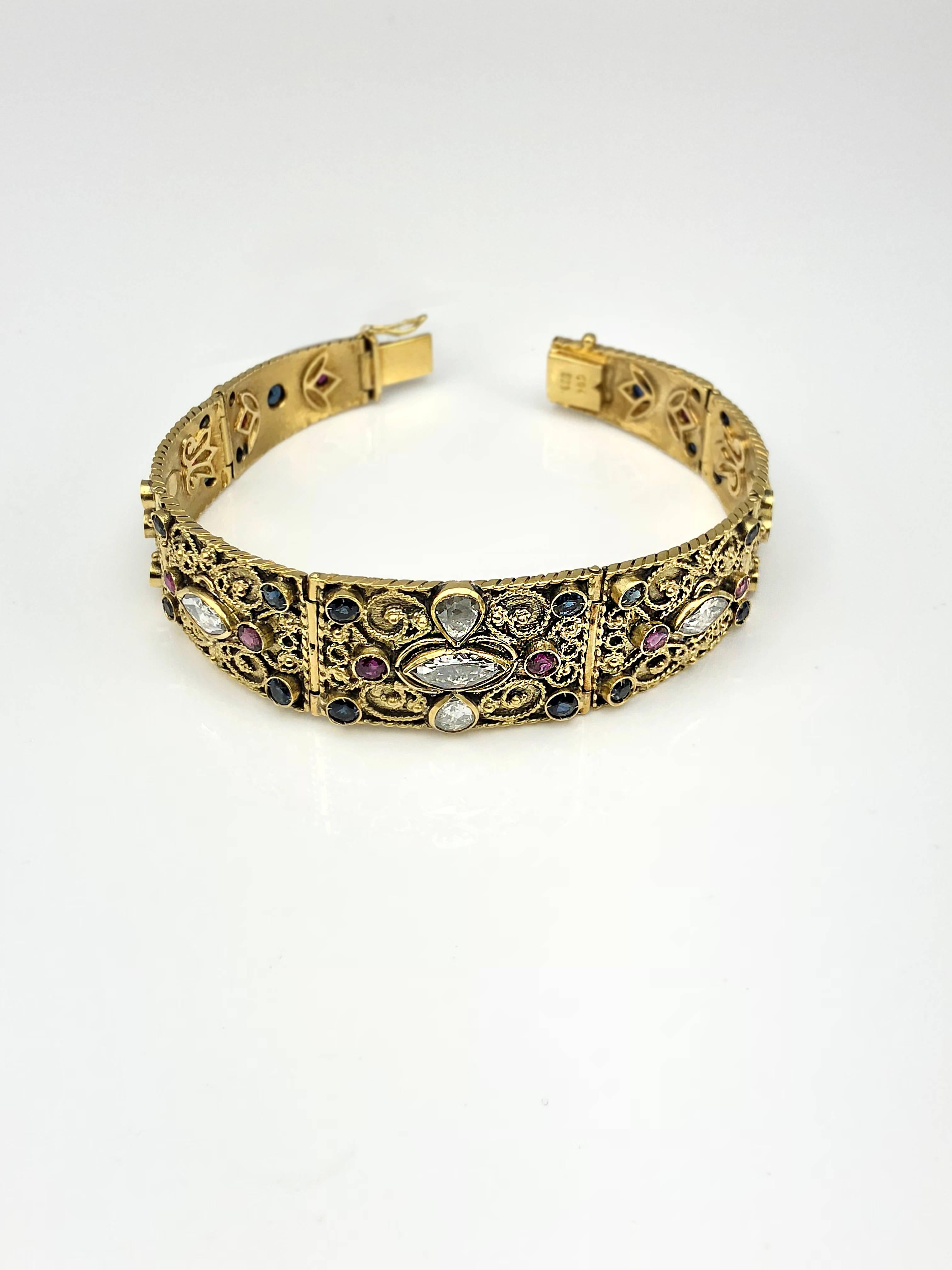 S.Georgios designer 18 Karat Yellow Gold Diamond Bracelet decorated in Byzantine Style with granulation work is all custom-made. The unique bracelet thanks to its design fits nicely on the wrist. This jewel features 3.00 Carat of Diamonds in Pear