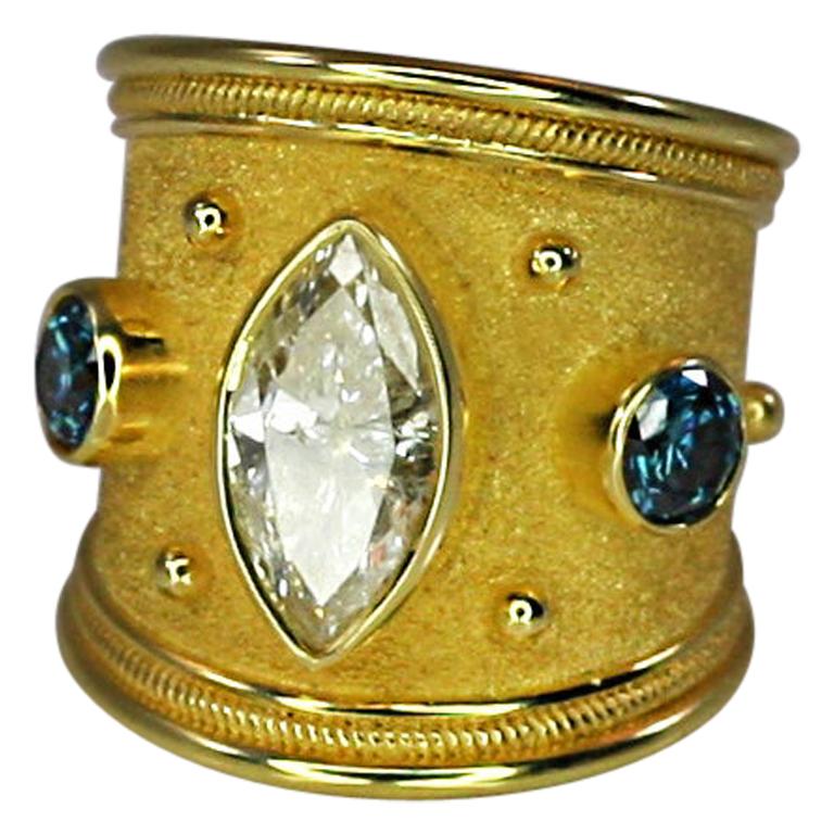 Georgios Collections: 18 Karat Gold Marquise-Diamant-Bandring mit blauen Diamanten