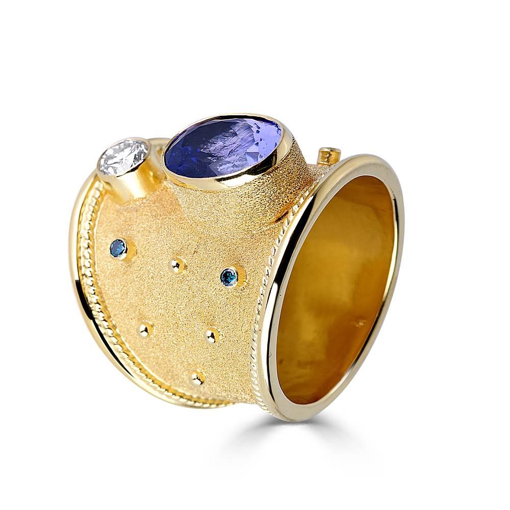 One of a kind S.Georgios designer 18 Karat Solid Yellow Gold Ring all handmade with the Byzantine workmanship.  It is decorated microscopically with 22 karat granulation decors and a unique velvet look on the background. The ring is featuring an