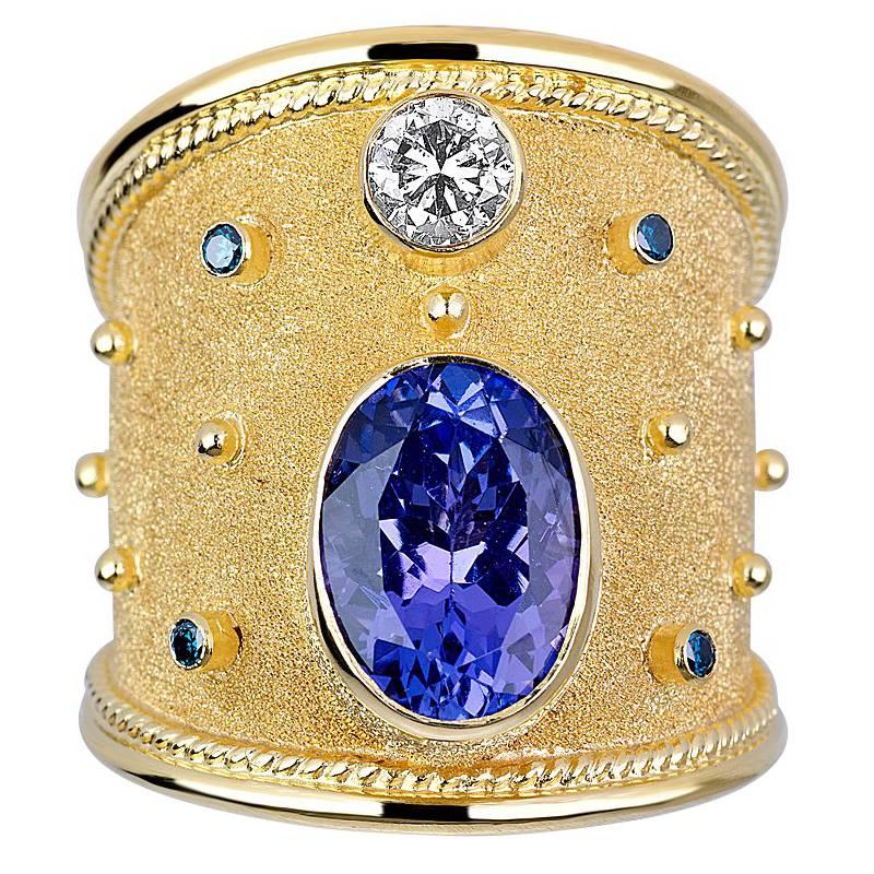 Georgios Collections 18 Karat Yellow Gold Tanzanite and White Blue Diamonds Ring For Sale