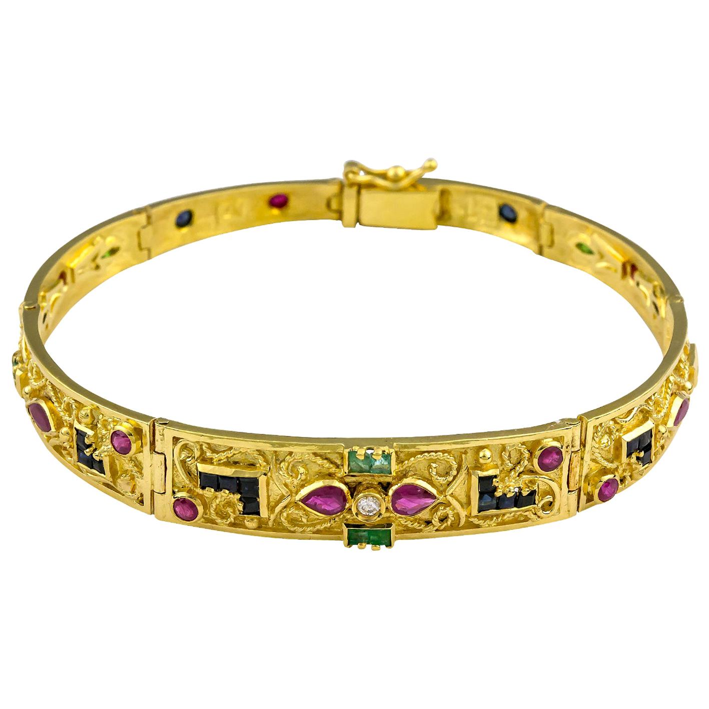 Georgios Kollektionen Armband aus 18 Karat Gold Rubin, Smaragd, Saphir und Diamant
