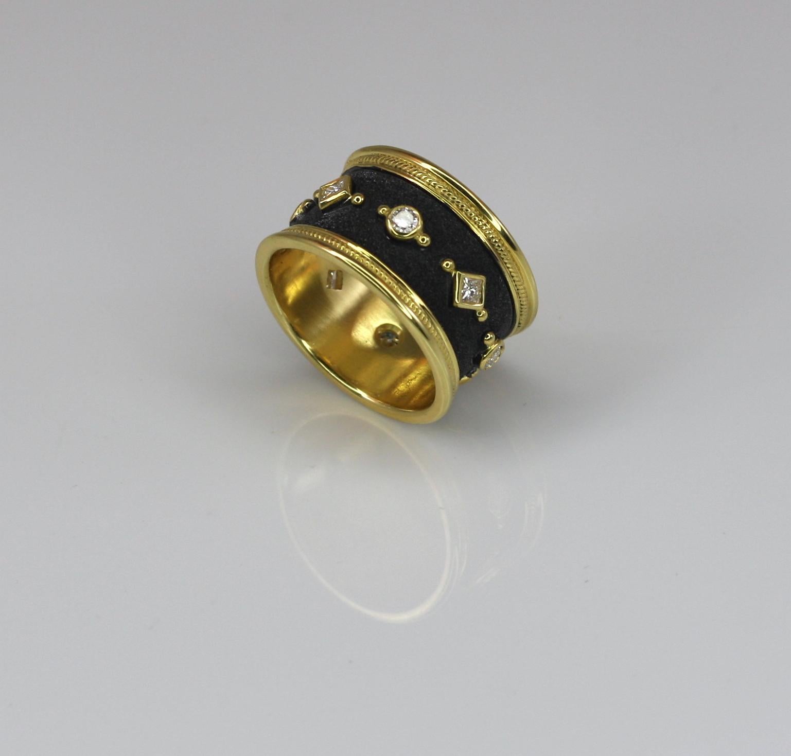 S.Georgios designer eternity band ring all handmade from solid 18 Karat yellow gold and microscopically decorated all the way around with gold beads and wires. The unique velvet background is finished with black rhodium which created a perfect