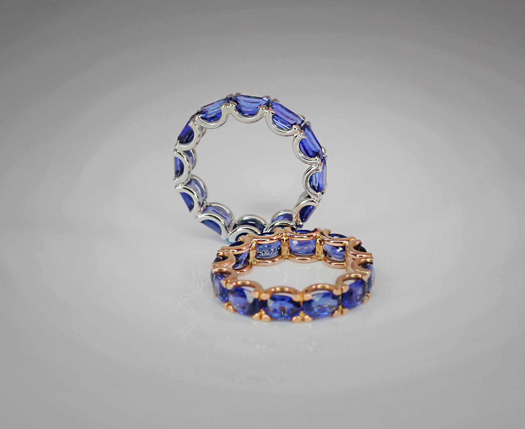 This S.Georgios designer eternity band Ring is all hand-made in 18 Karat Rose Gold and features oval cut natural Blue Sapphires total weight of 7.38 Carat. The magic of this beautiful band is that we selected all the sapphires to be of identical