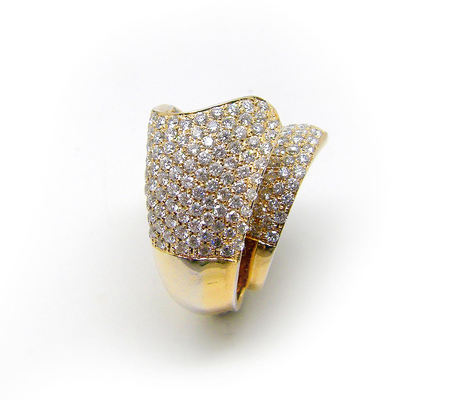 This S.Georgios designer 18 Karat Rose Gold White Brilliant Cut Diamond Wide Band Ring is all handmade in a unique design. The gorgeous wide band features brilliant-cut white diamonds total weight of 3.90 Carat which is set in an overlapping design