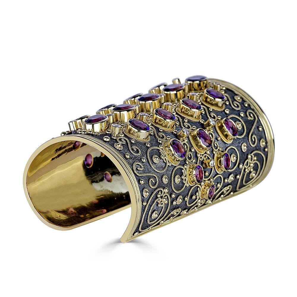 This rare bracelet is handmade from solid 18 Karat Yellow Gold and is decorated with the use of a microscope for precise detail. The decorations are all set individually one by one from 22 Karat solid yellow gold - granulation workmanship. The