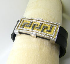 Bracciale in oro bianco 18 carati e diamanti bianchi neri e marroni di Georgios Collections