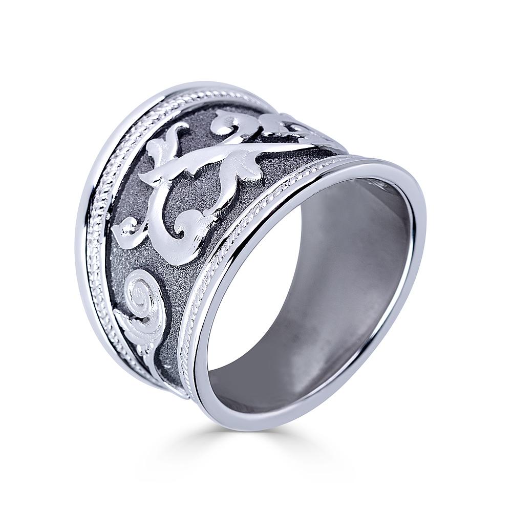 S.Georgios designer ring is all handmade from solid 18 Karat White Gold and custom-made. The thegorgeous ring is microscopically decorated with White Gold decorations. Granulated details contrast with Byzantine velvet background finished with Black