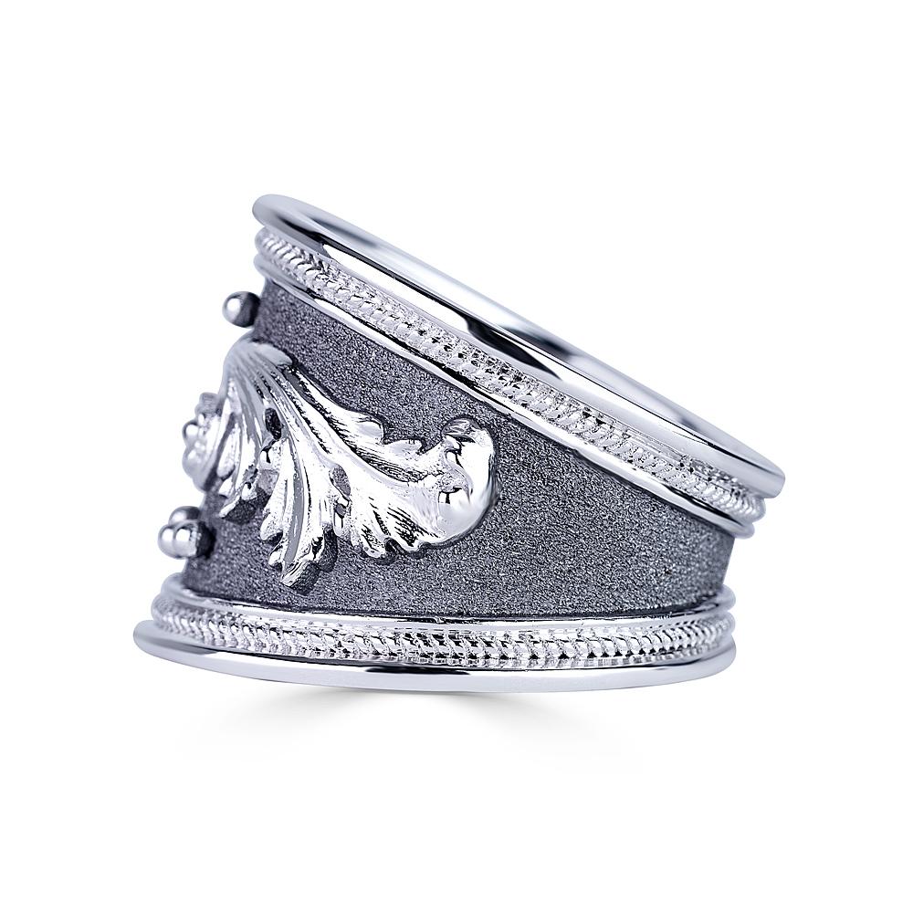 S.Georgios designer ring is all handmade from solid 18 Karat White Gold and custom-made. The gorgeous ring is microscopically decorated with White Gold Details and has Granulated details in contrast with a Byzantine velvet background finished with