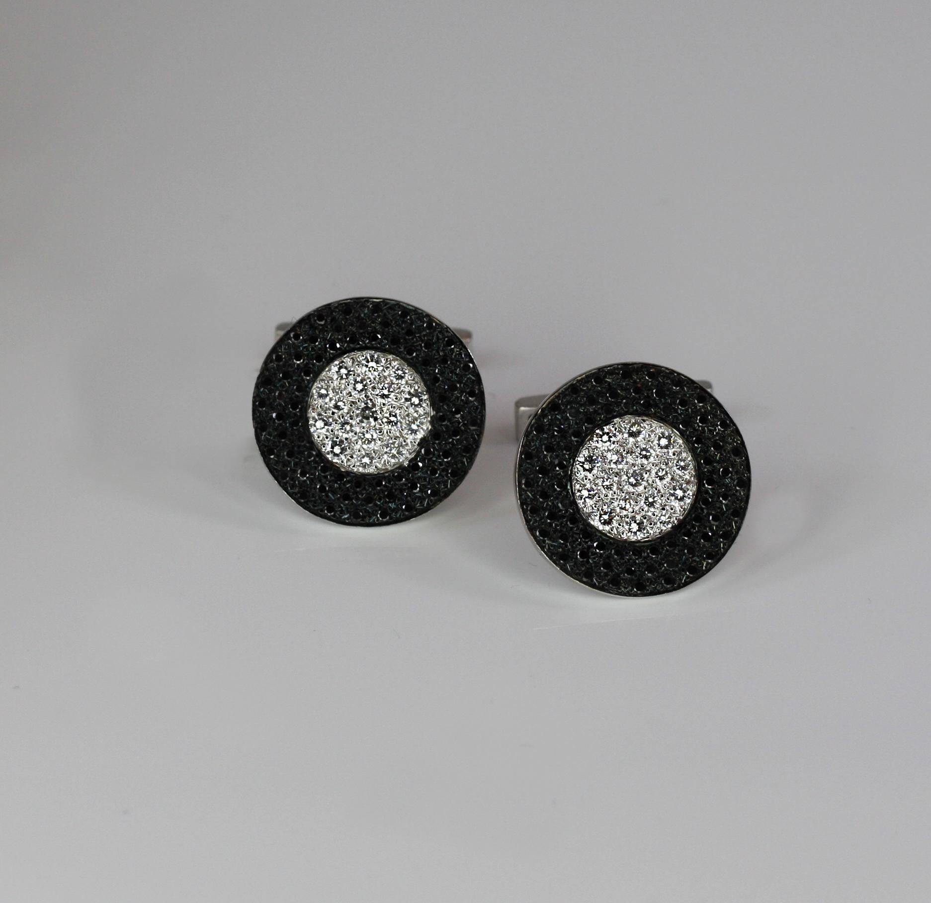 S.Georgios designer cufflinks handcrafted in Greece from 18 Karat white gold and decorated with 1.02 Carat brilliant cut white diamonds and 1.56 Carat brilliant cut black diamonds. 
These gorgeous pieces can be also ordered in all Yellow or Rose