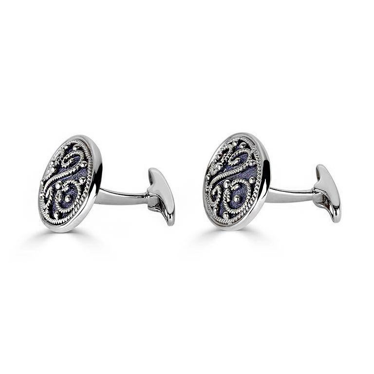 S.Georgios designer cufflinks handcrafted in Greece from 18 Karat white gold and black rhodium. Cufflinks are microscopically decorated with granulation work in Byzantine style and with a unique velvet background. Also, the mechanism on the back is