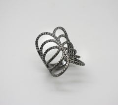 Anello a spirale con diamante bianco e rodio nero in oro bianco 18 carati Georgios Collections