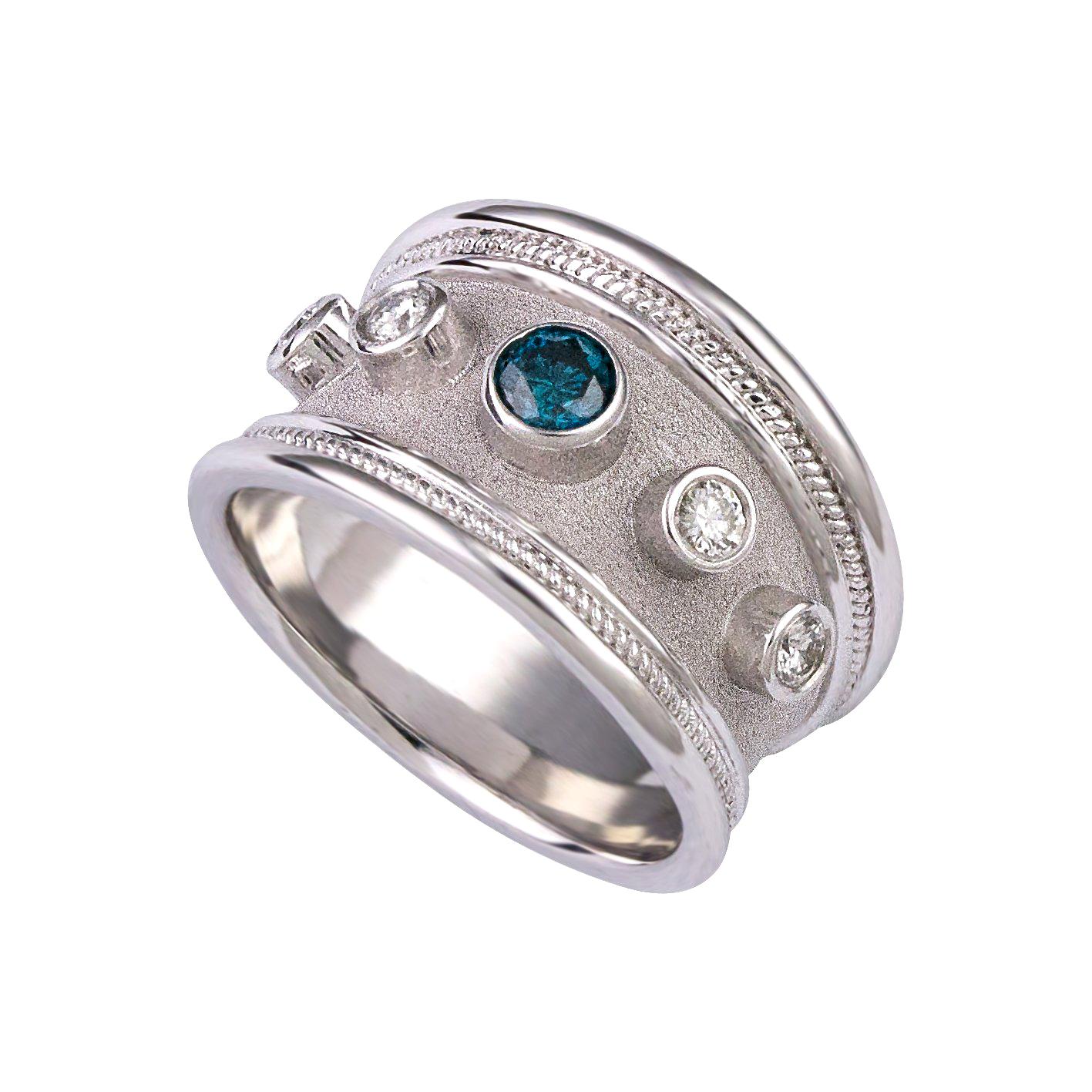 Georgios Collections: 18 Karat Weißgold Bandring mit blauem und weißem Diamanten in der Mitte