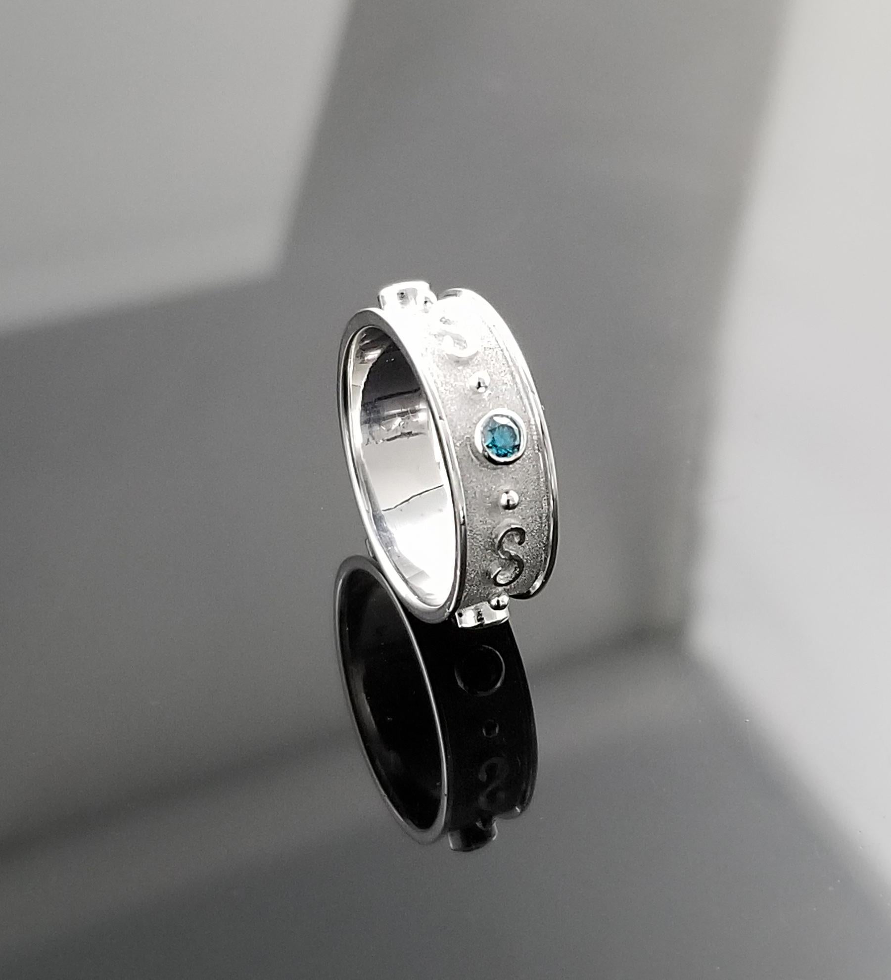 S.Georgios design Ring is handmade from solid 18 Karat White Gold and is microscopically decorated with Granulation work all the way around with white gold beads and wires shaped like the symbol of long life, the Greek Key Design. This gorgeous band