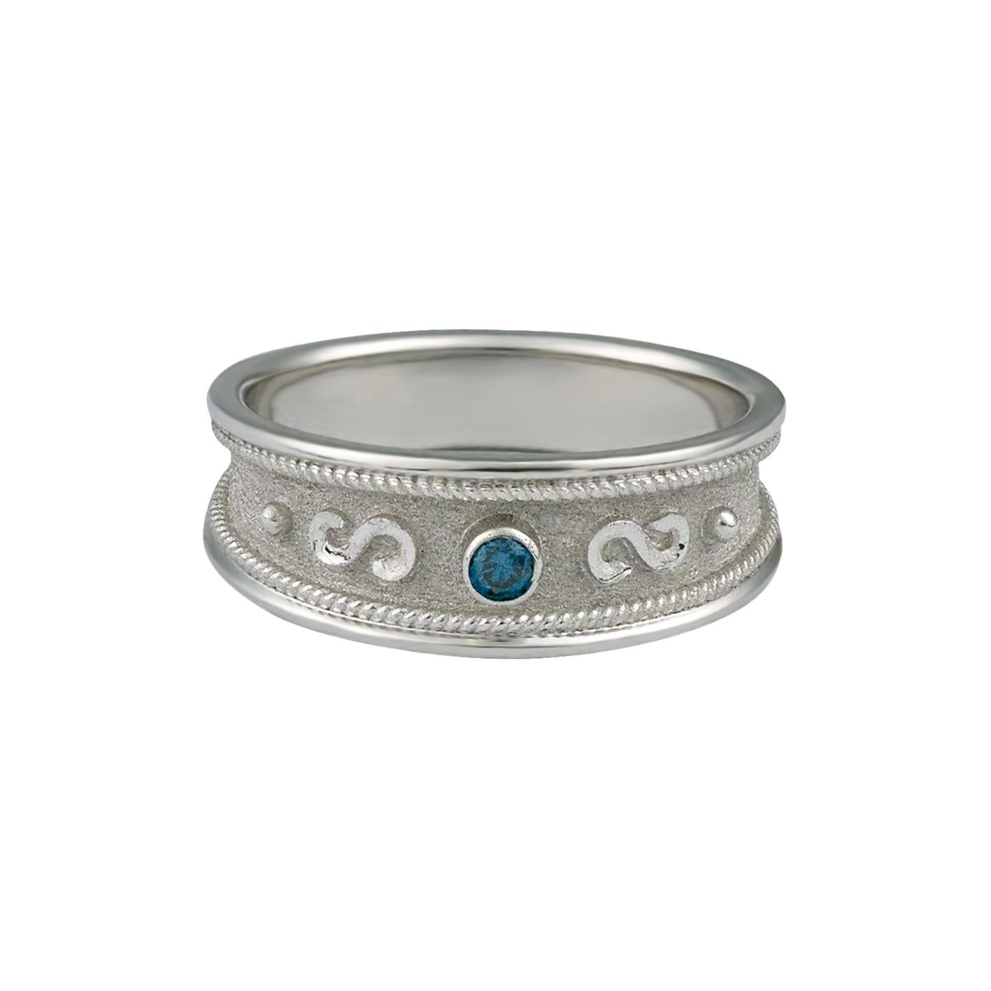 S.Georgios designer Band Ring is handmade from solid 18 Karat White Gold all custom-made. The stunning ring is microscopically decorated with white gold wires -granulated details contrast with a unique Byzantine velvet background. This beautiful