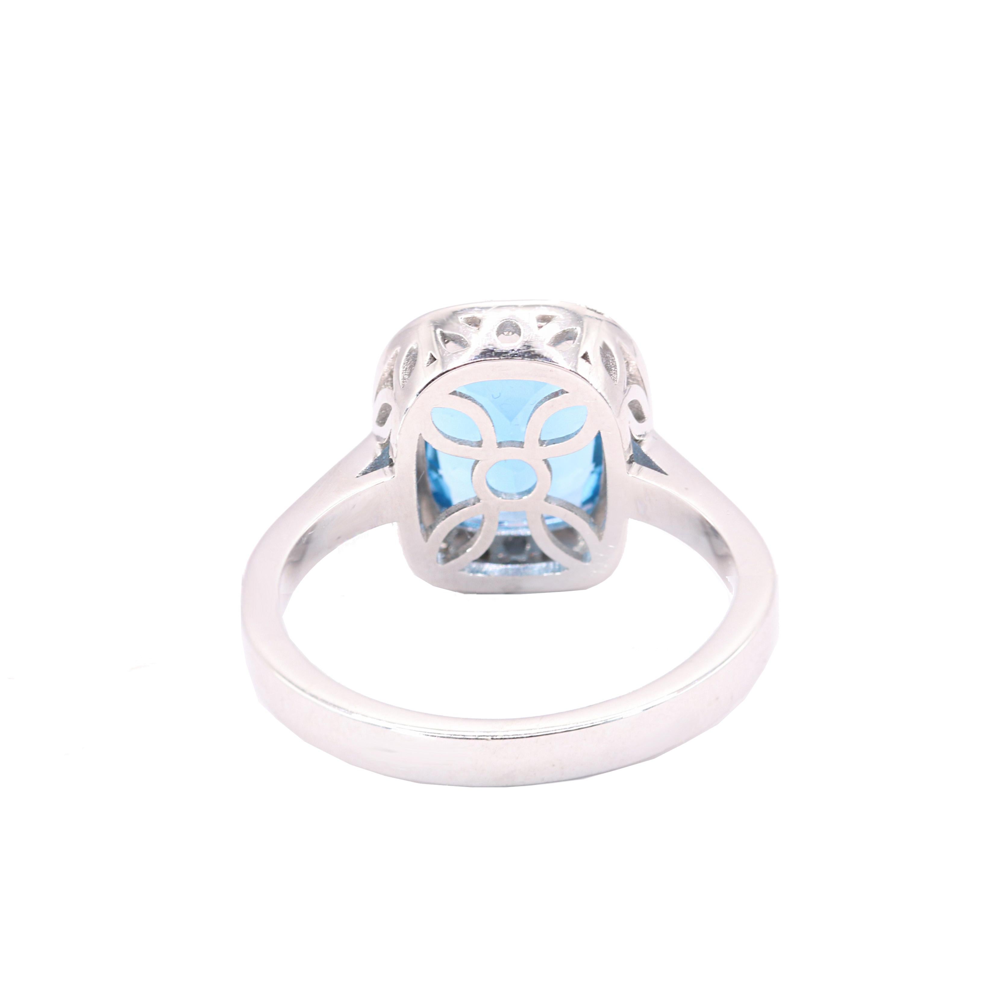Oval Cut Georgios Collections 18 Karat White Gold Blue Topaz Ring with Diamond Bezel For Sale