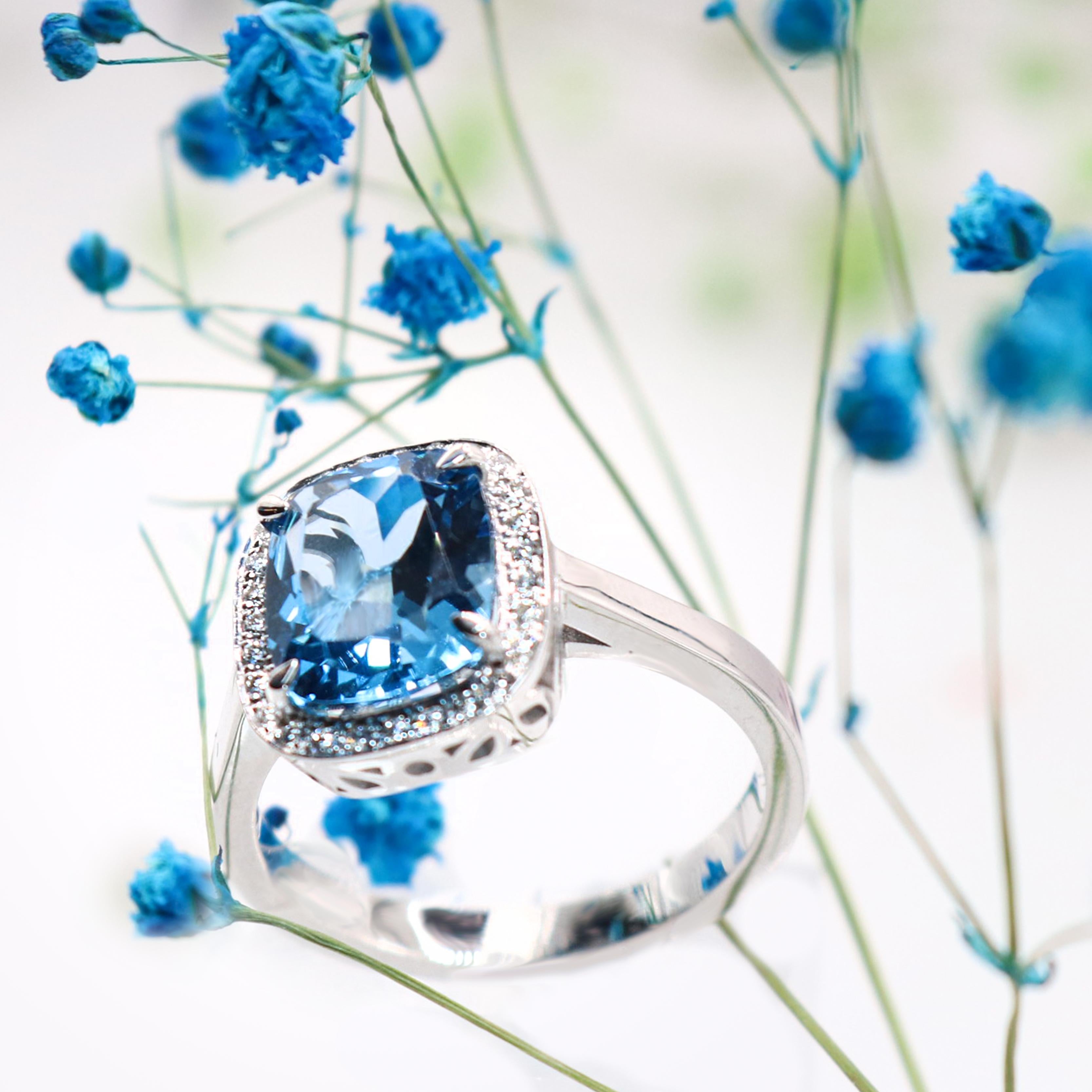 Women's Georgios Collections 18 Karat White Gold Blue Topaz Ring with Diamond Bezel For Sale