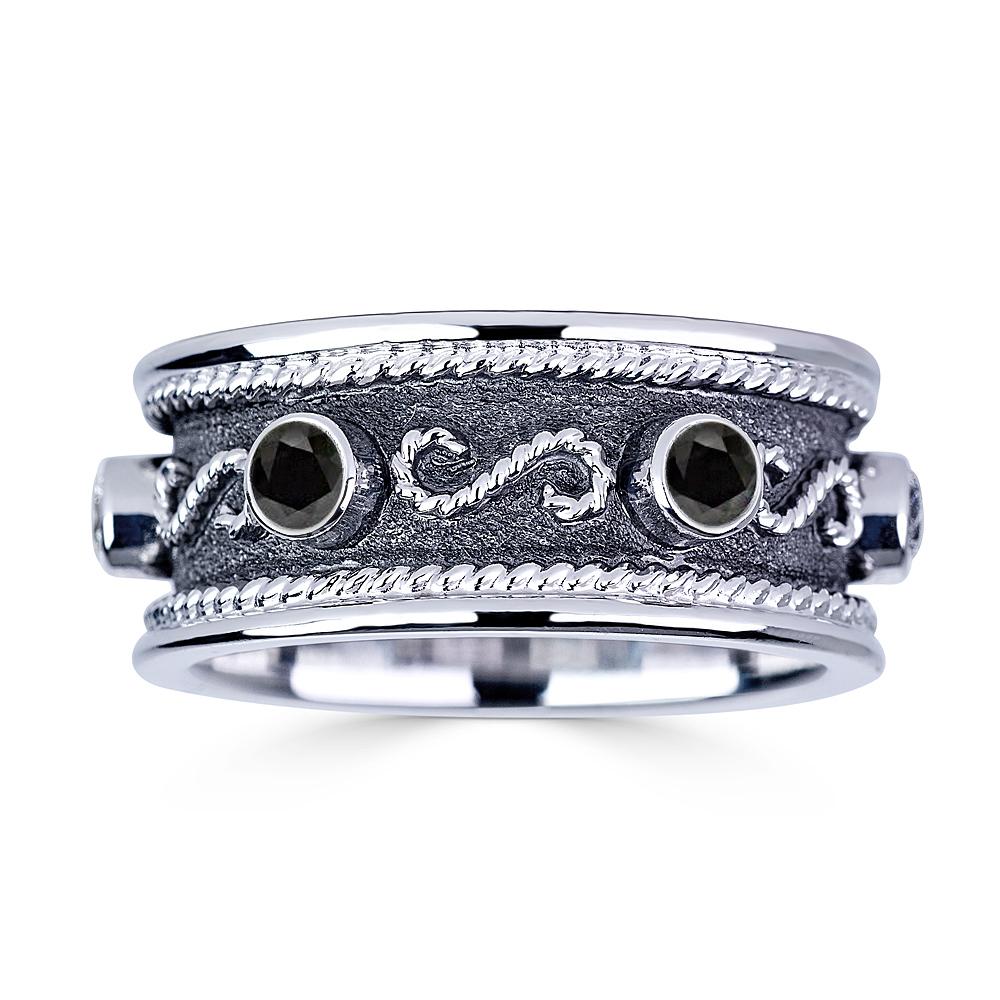 S.Georgios designer men's and women's band rings handmade from solid 18 Karat White Gold. The gorgeous piece is microscopically decorated all the way around with white gold wires with the Greek design symbolizing eternal life. Granulated details