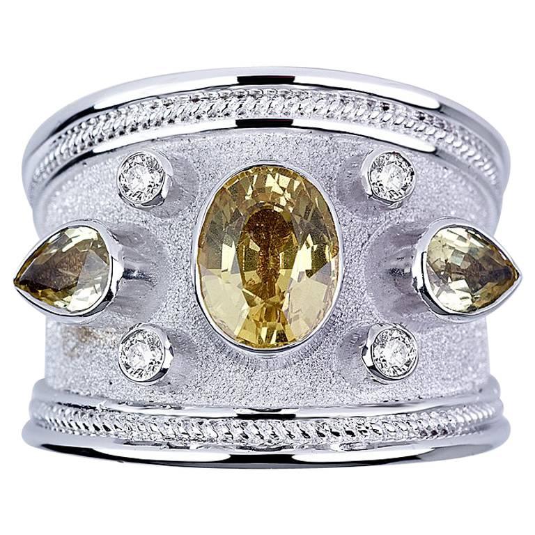 Georgios Collections Ring aus 18 Karat Weißgold mit Diamanten und grünen Saphiren