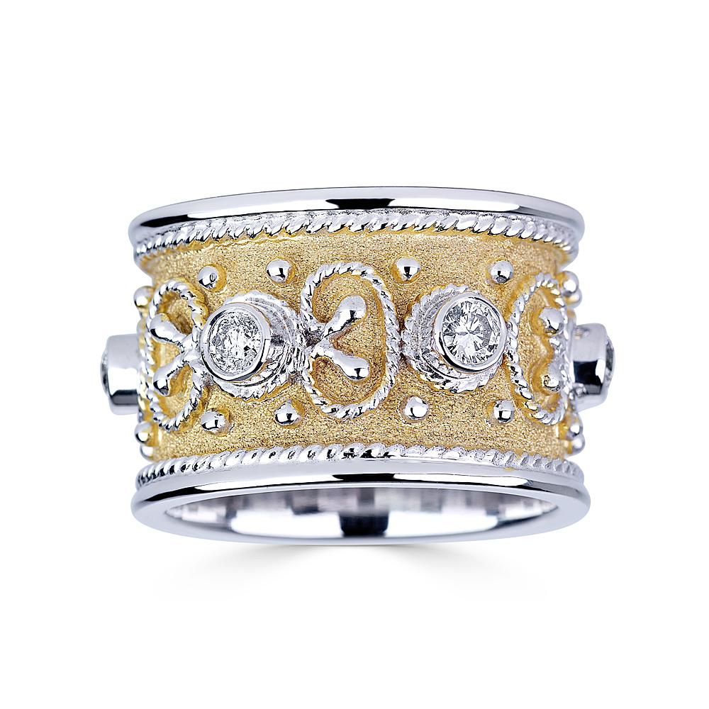 S.Georgios designer Band Ring all Handmade from solid 18 Karat White Gold. The beautiful art piece is microscopically decorated all the way around with white gold beads and wires shaped like the last letter of the Greek Alphabet - Omega, which