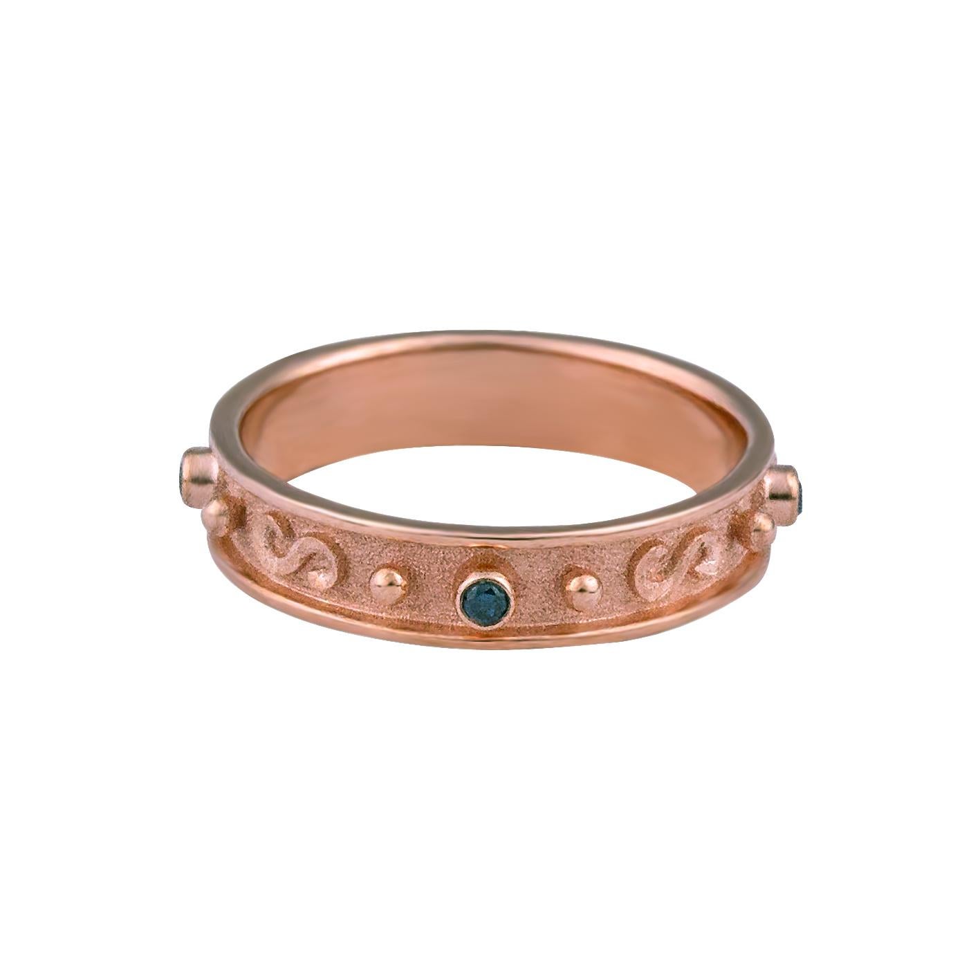 This S.Georgios design ring is handmade from solid 18 Karat Rose Gold and is microscopically decorated with granulation work - rose gold beads and wires - all the way around. This beautiful band features 4 Brilliant cut Blue Diamonds total weight of