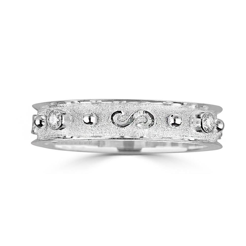 S.Georgios design ring handmade from solid 18 Karat White Gold and microscopically decorated with Granulation work all the way around with white gold beads and wires. This gorgeous band ring features 4 Brilliant cut Diamonds total weight of 0.16