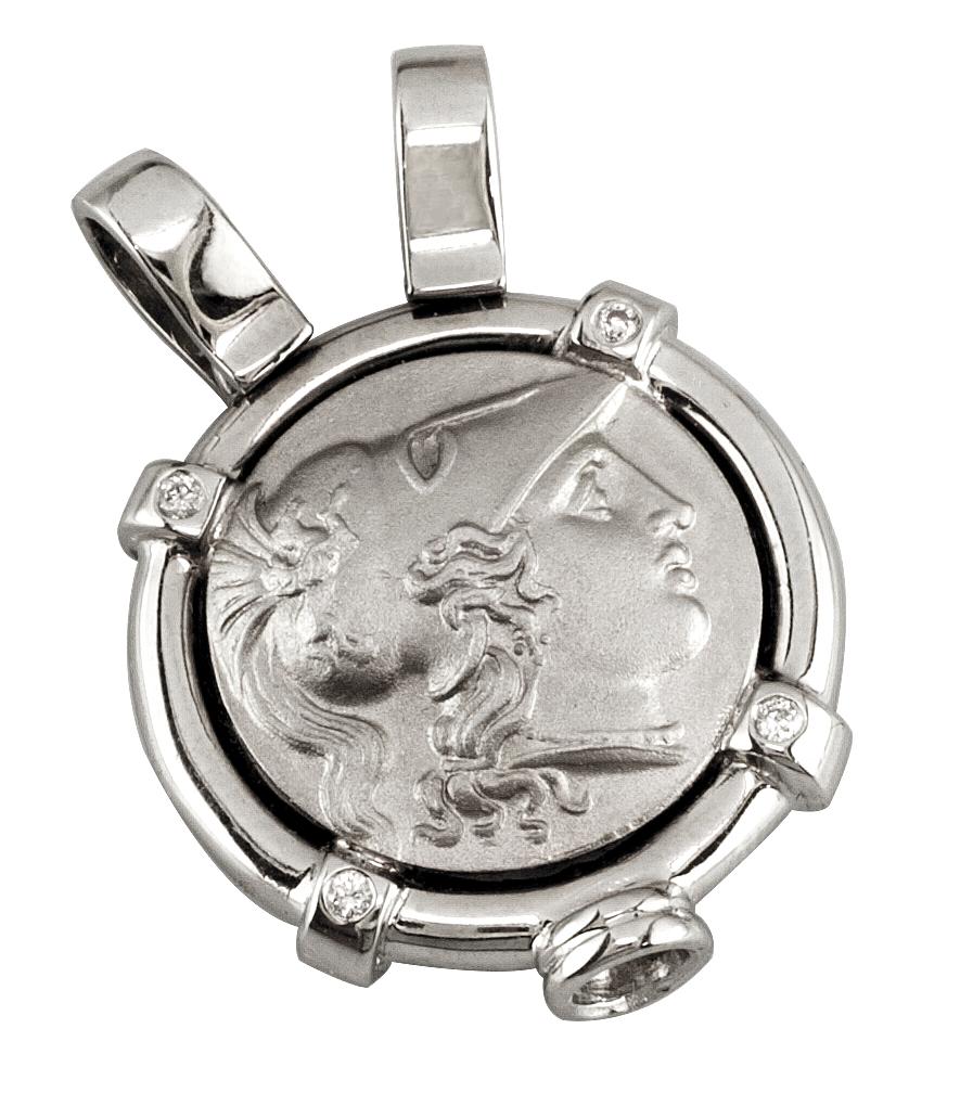 This S.Georgios solid 18 Karat White Gold Diamond Coin Pendant is all made by hand and features a white Gold Coin of Athena the Goddess of Wisdom, and the Symbol of Strength (the coin is an exact copy of the original), and we have also set 4