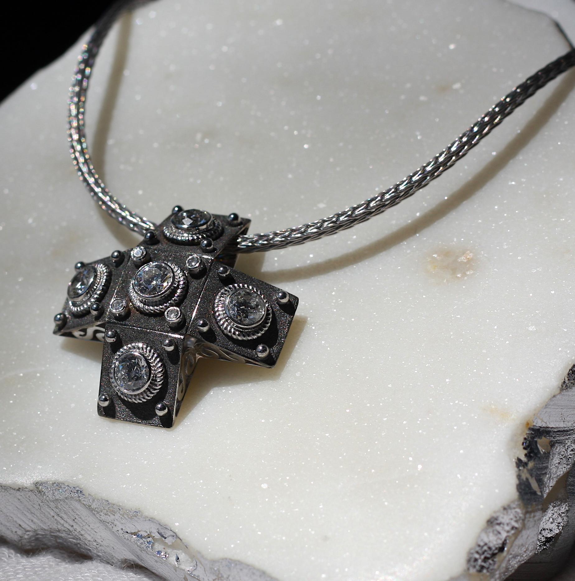 S.Georgios designer Cross in solid 18 Karat White Gold all handmade with Byzantine workmanship. This cross is decorated with granulation details and the unique Byzantine velvet surface finished with Black Rhodium, the most expensive metal in the