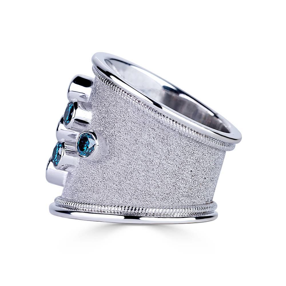 Unique S.Georgios designer Hand Made 18 Karat White Gold Ring. It is all custom made and has granulation work with twisted wire on the sides, and features 6 (six) Brilliant cut Blue Diamonds with total weight of 1.20 Carat and 3 (three)