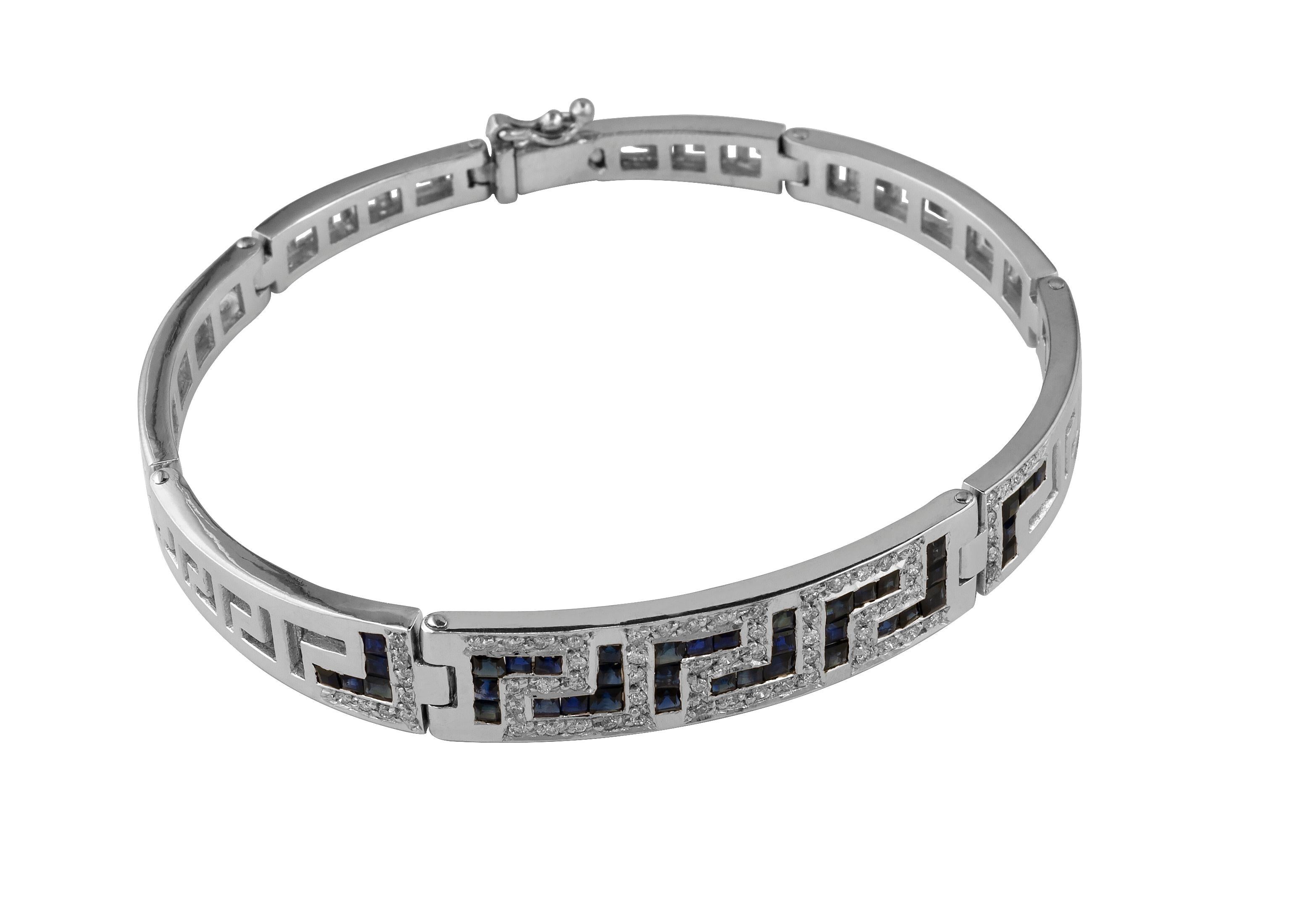 S.Georgios designer link bracelet in solid 18 karats White Gold all handmade with the Greek Key design, the symbol of eternal life. The gorgeous Bracelet is custom made and has 65 brilliant cut white diamonds total weight of 0.56 Carat and 40