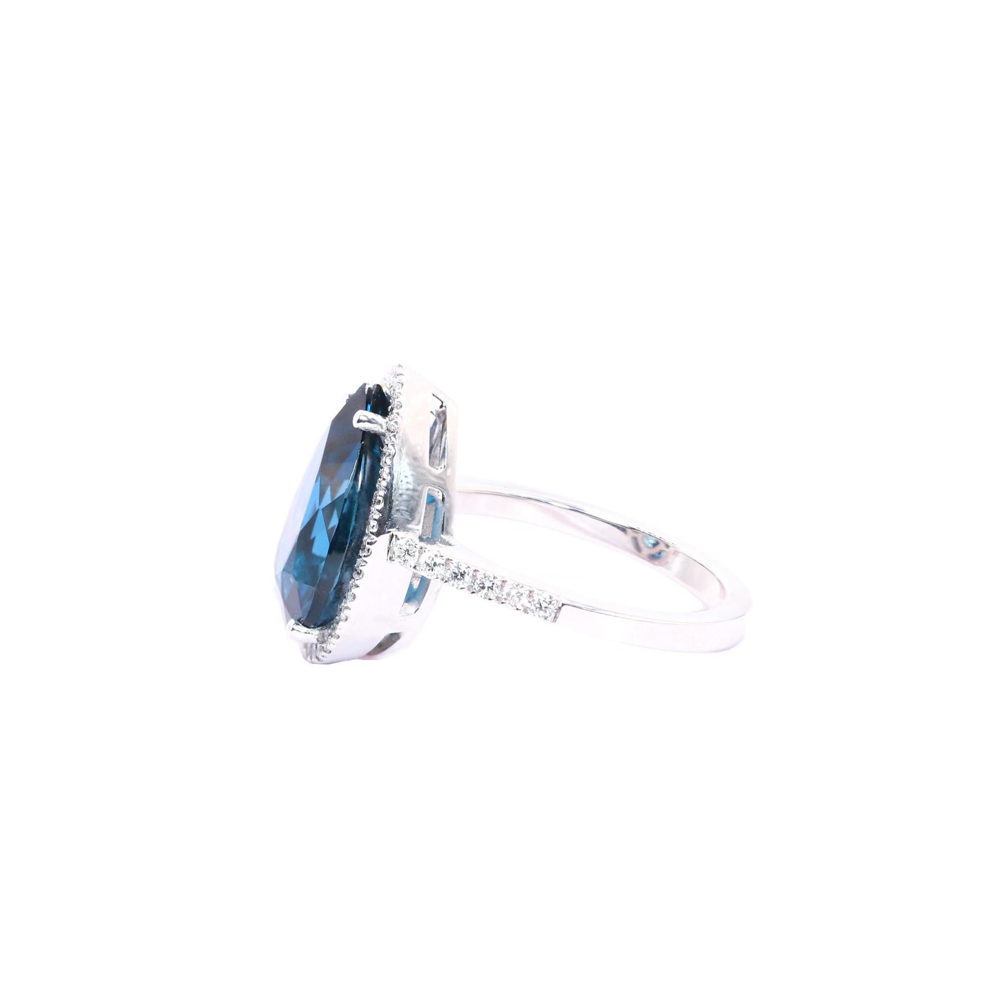 Contemporary Georgios Collections 18 Karat White Gold Pear Blue Topaz Ring with Diamonds For Sale