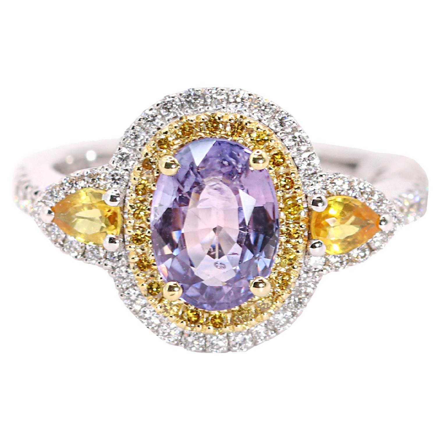 Georgios Kollektionen Ring aus 18 Karat Weißgold mit lila und gelbem Saphir