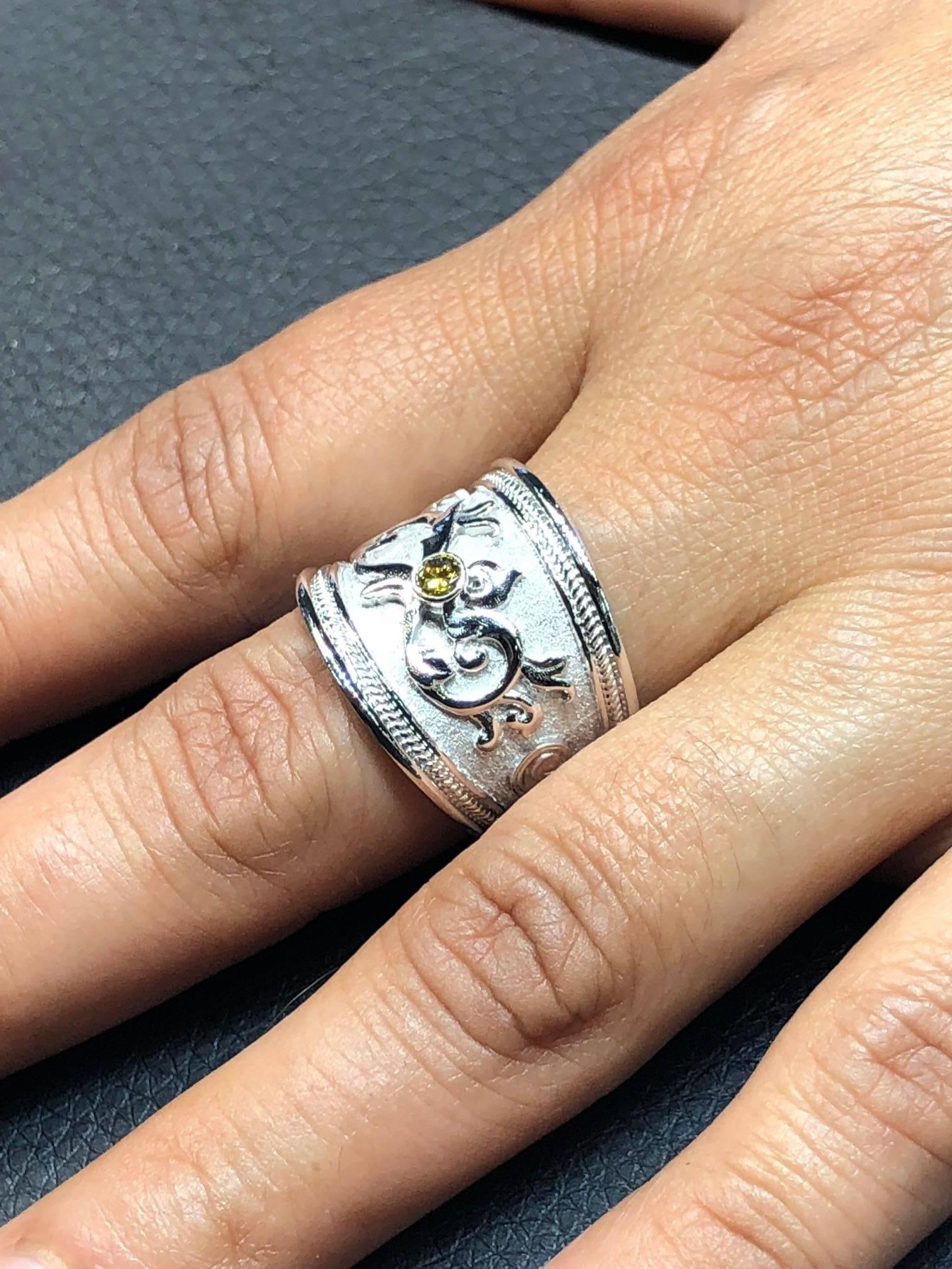 S.Georgios designer ring all handmade from solid 18 Karat White Gold. This Byzantine style ring is microscopically decorated - granulation work all the way around with white gold beads and wires shaped like the last letter of the Greek Alphabet -