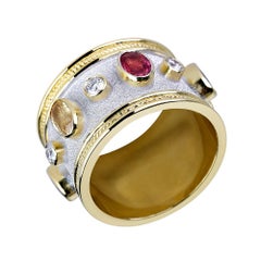 Anello con diamanti e zaffiri multipli in oro giallo e bianco 18 carati Georgios Collections