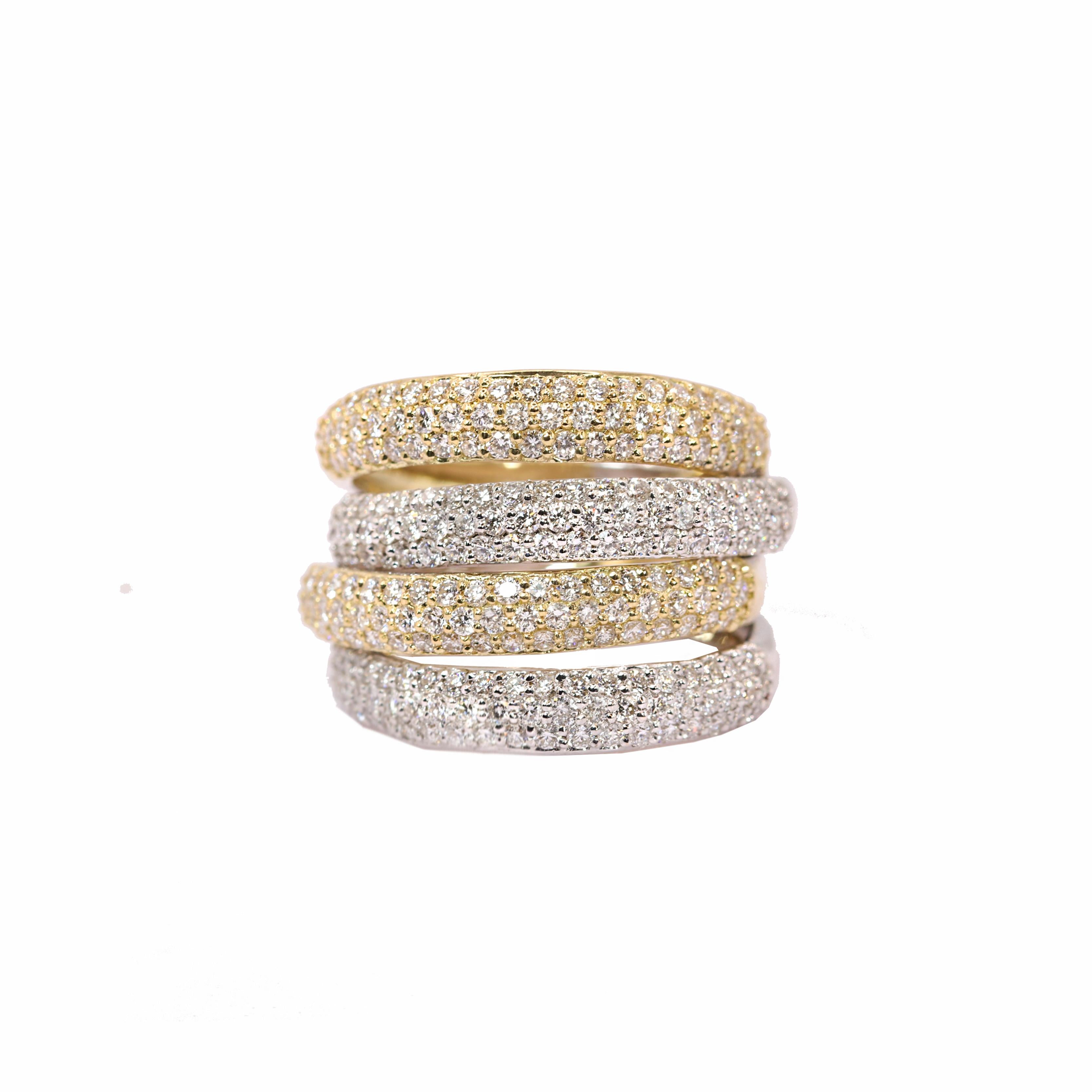S.Georgios designer presents a luxurious modern 18K Yellow and White Gold Ring adorned with 2,45 carats of stunning Brilliant cut  Diamonds. This dazzling piece, meticulously handcrafted in Athens, Greece, radiates opulence and sophistication. The