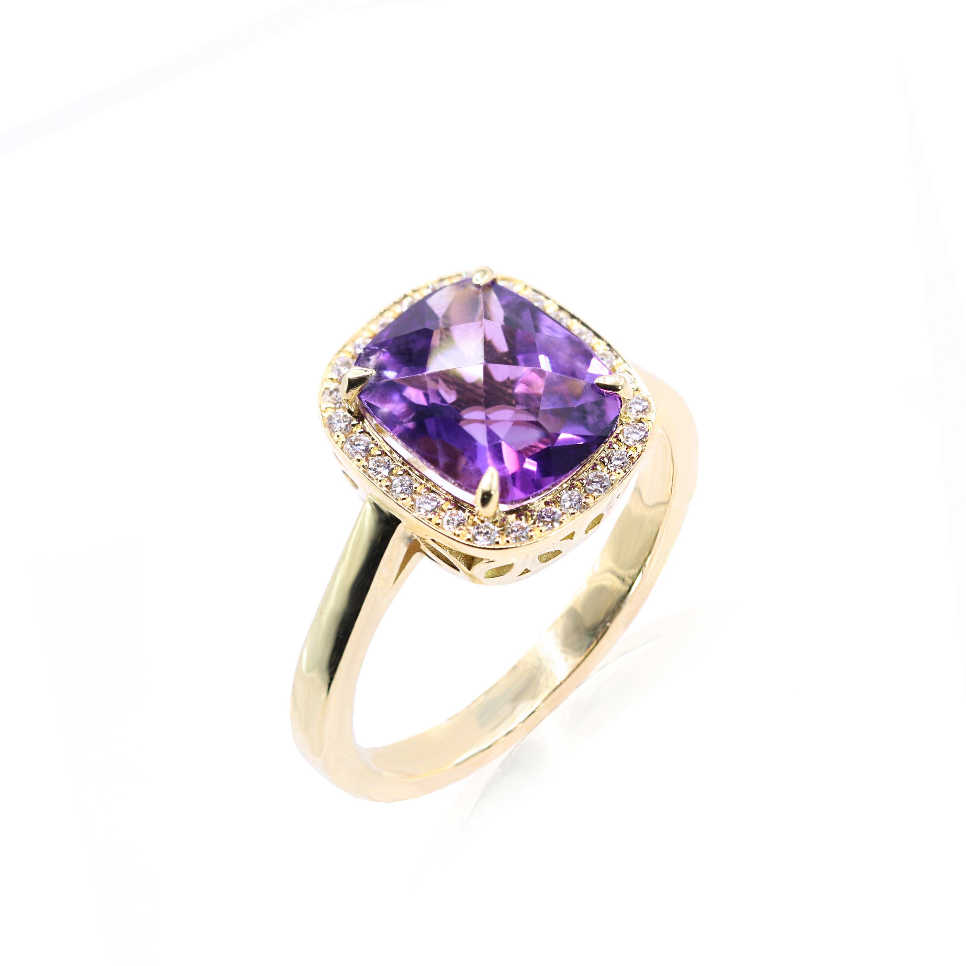 S.Georgios designer presents an oval shape 2.57 Carats Amethyst ring with a White Diamond Bezel with a total weight of 0.15 Carats. This simple yet stunning ring is handmade from 18 Karat Yellow Gold in Athens Greece. The ring features a beautiful