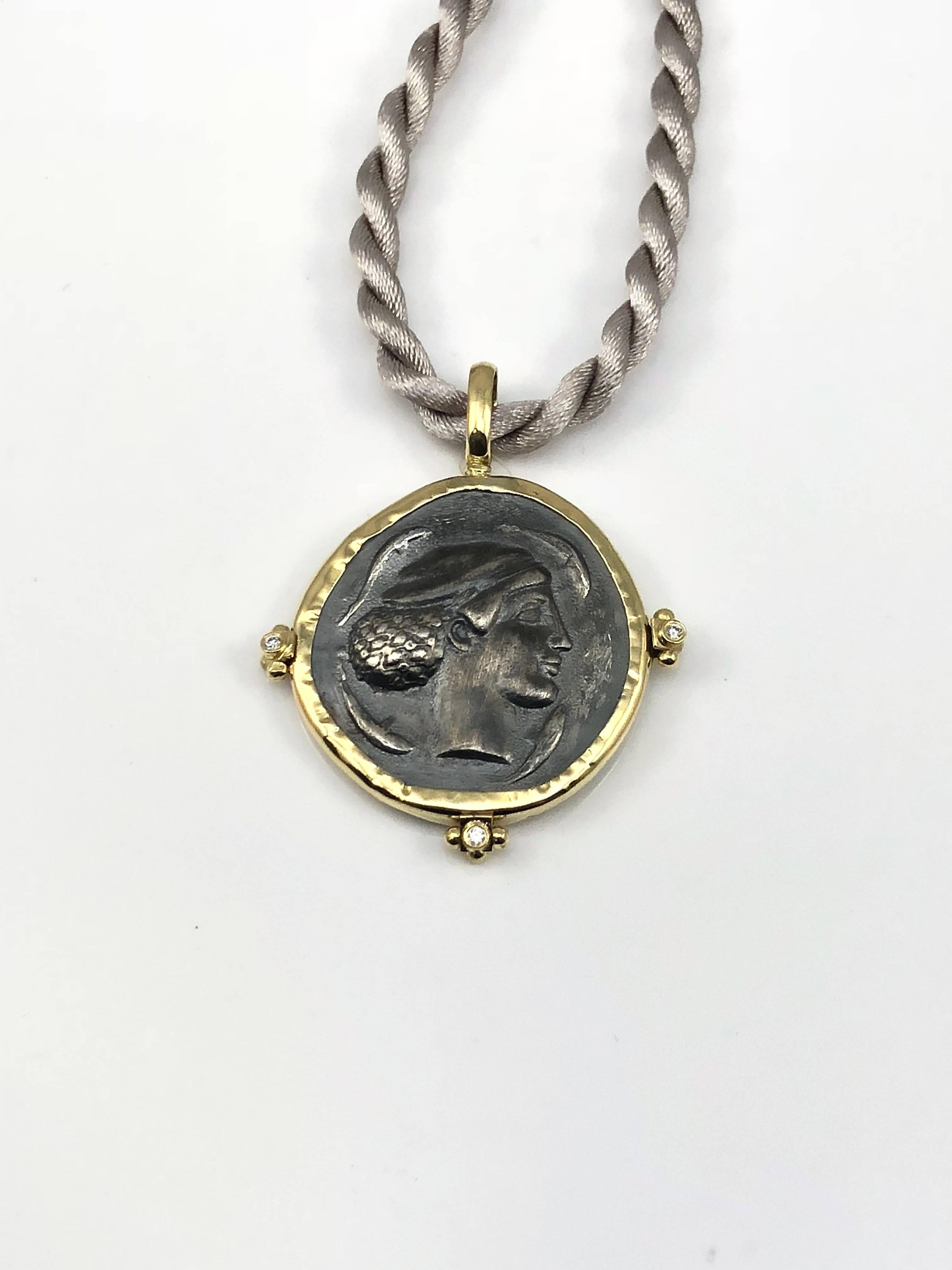 S.Georgios designer 18 Karat Yellow Gold handmade Pendant Necklace featuring 3 Brilliant cut Diamonds total weight of 0.03 Carat and a replica of an Ancient Greek Dimitra Coin in Silver 925. The coin has a beautiful reverse side and can be worn both