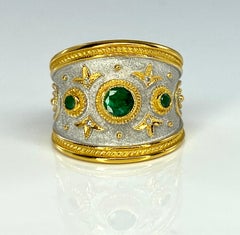 Georgios Kollektionen Smaragdring aus 18 Karat Gelbgold und weißem Rhodium mit Diamanten und Smaragden