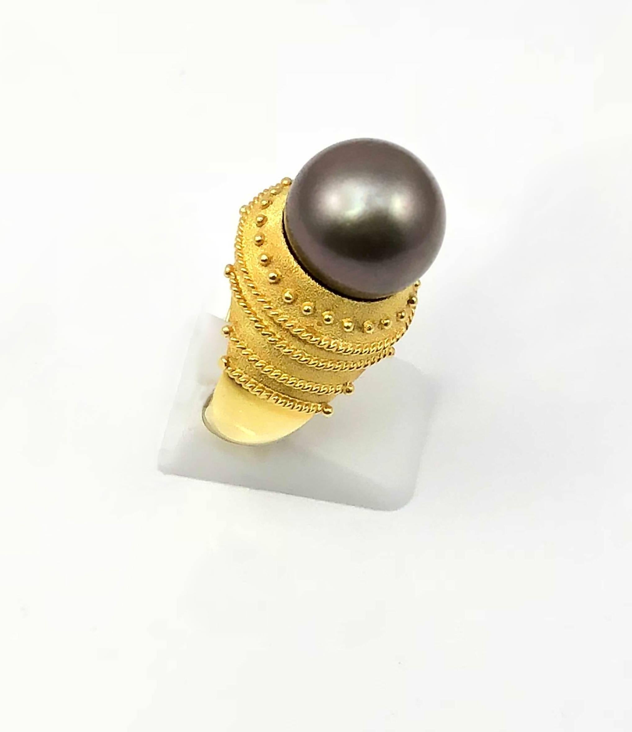 S.Georgios designer ring is all handmade from solid 18 Karat Yellow Gold and custom-made. This Byzantine-style ring is microscopically decorated with granulation work - beads and wires and beautiful velvet background. The gorgeous ring features a